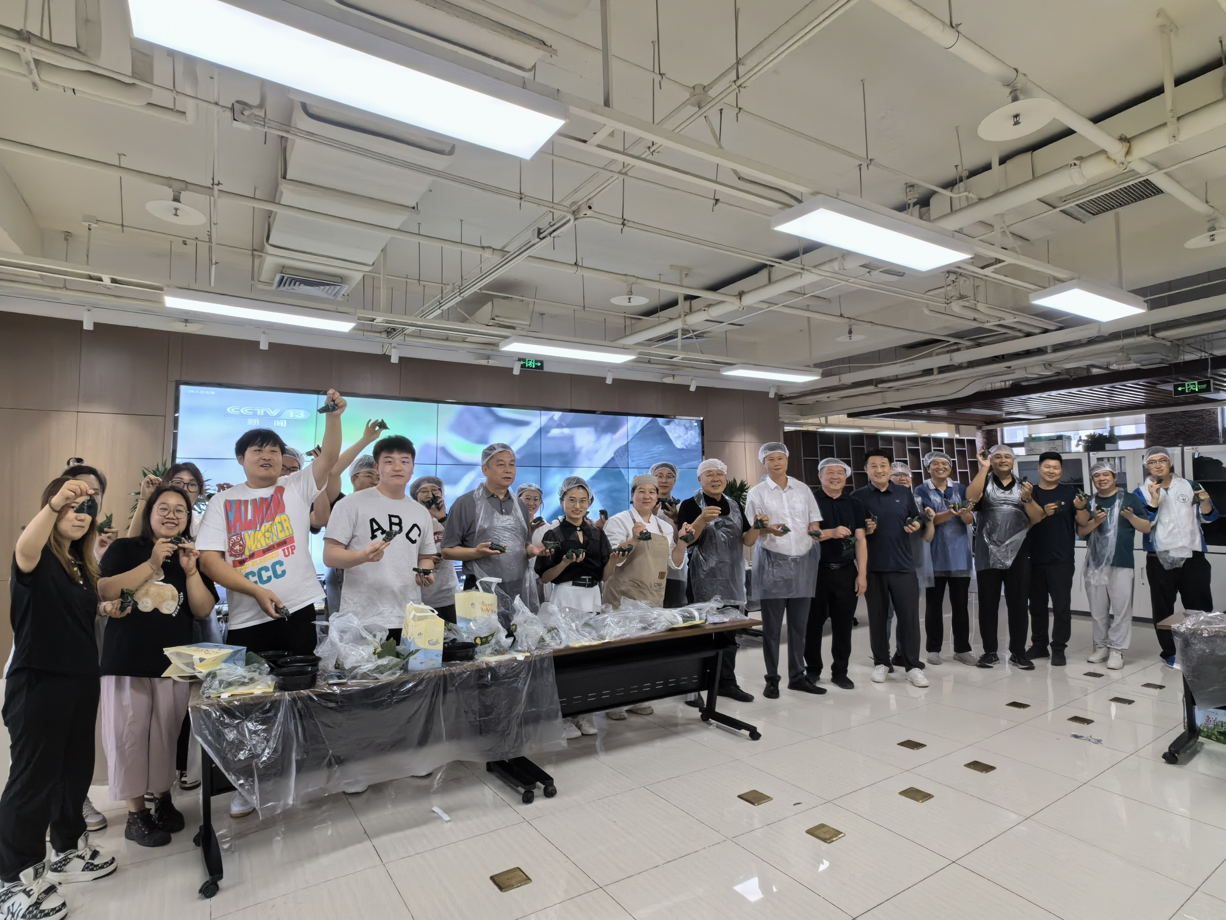 北京灾后沉建项目办进杏装粽之味 定之远”端午主题活动